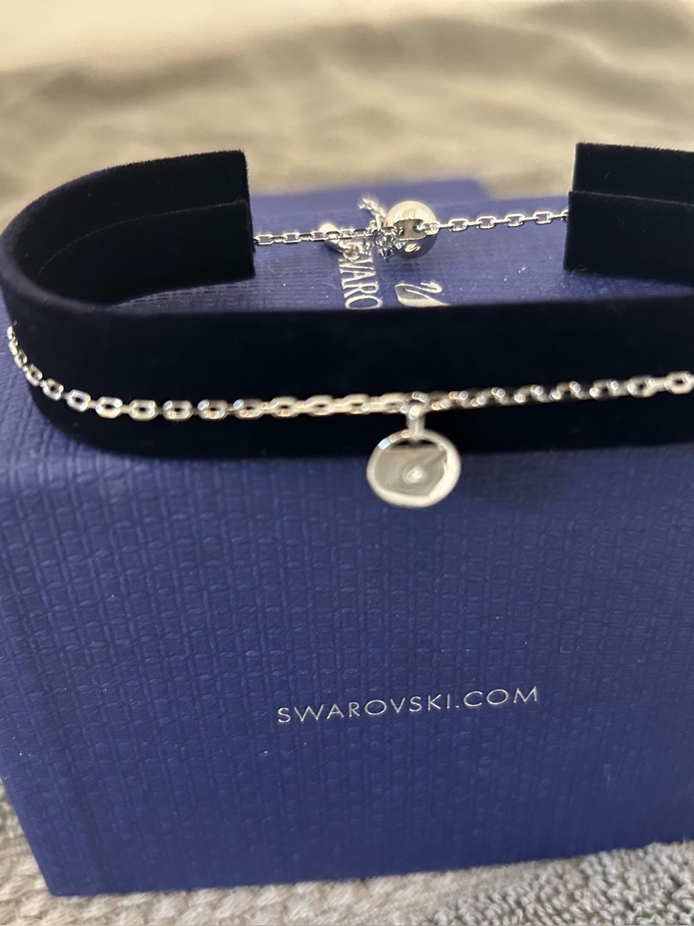 Swarovski authentic silvertone bracelet with adjustable sizing NEW in box